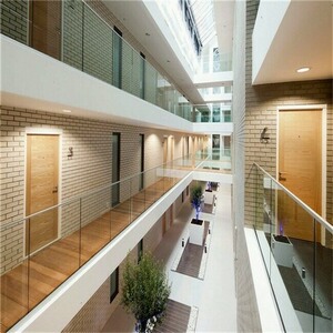 U channel glass railing with tempered glass